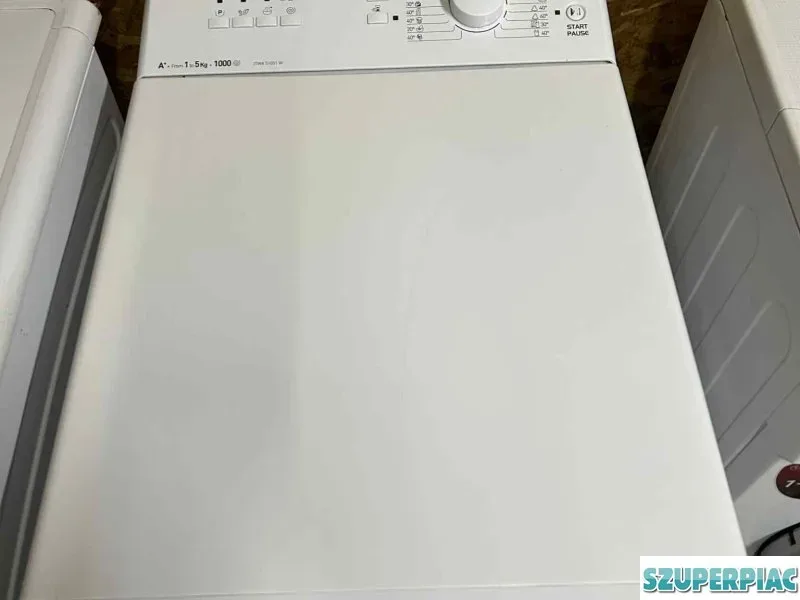 Eladó egy felültöltős Indesit mosógép garanciával